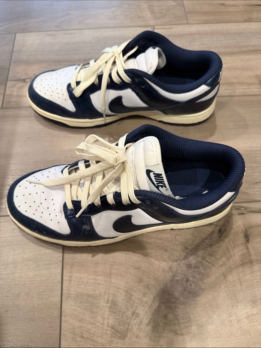 Nike Dunk Low-Top Sneakers in White and Navy. 10W. FN7197-100